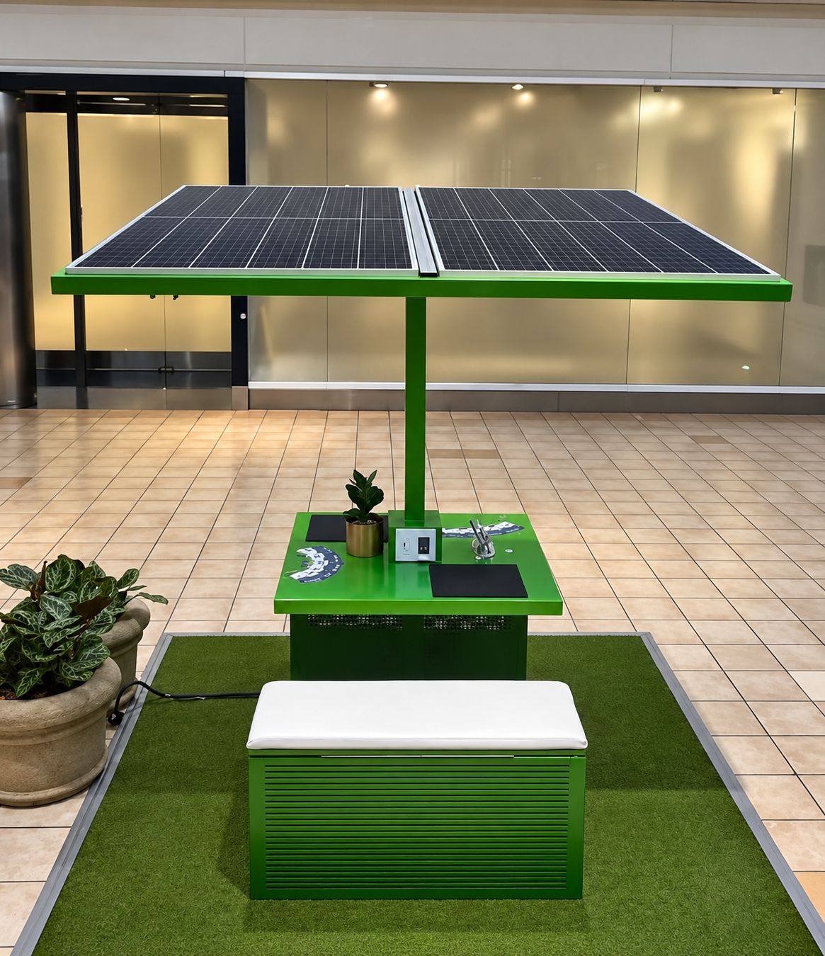 Mesa de carga con paneles solares y banco, en verde